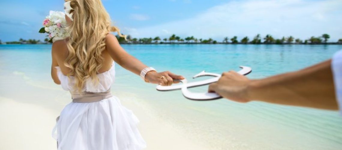 Young couple honeymoon on Maldives
